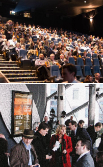 A group of people sitting in front of an audience.